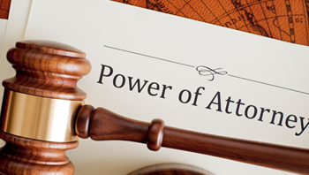Power of Attorney paperwork with court hammer