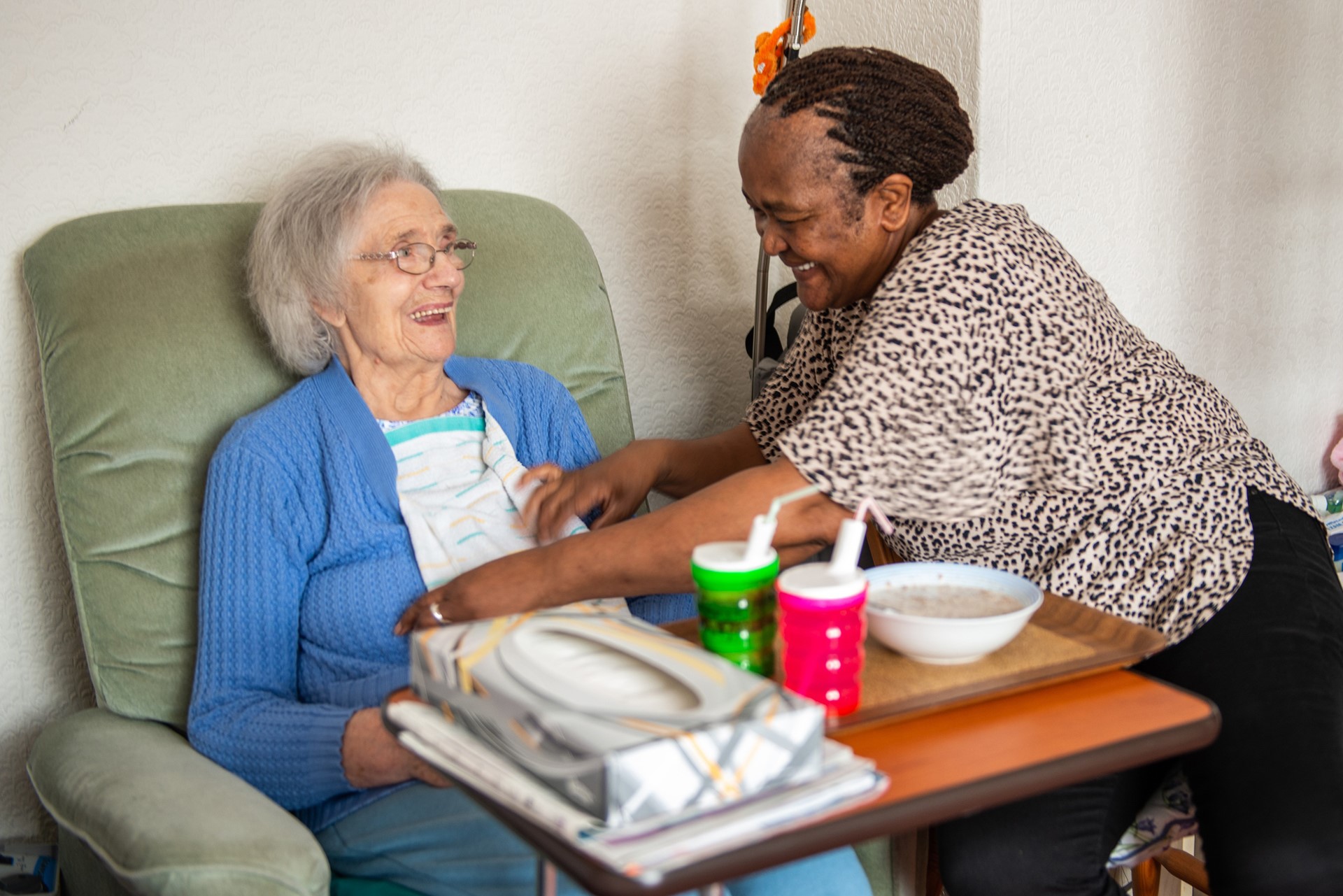 CareGiver helping client with mealtime