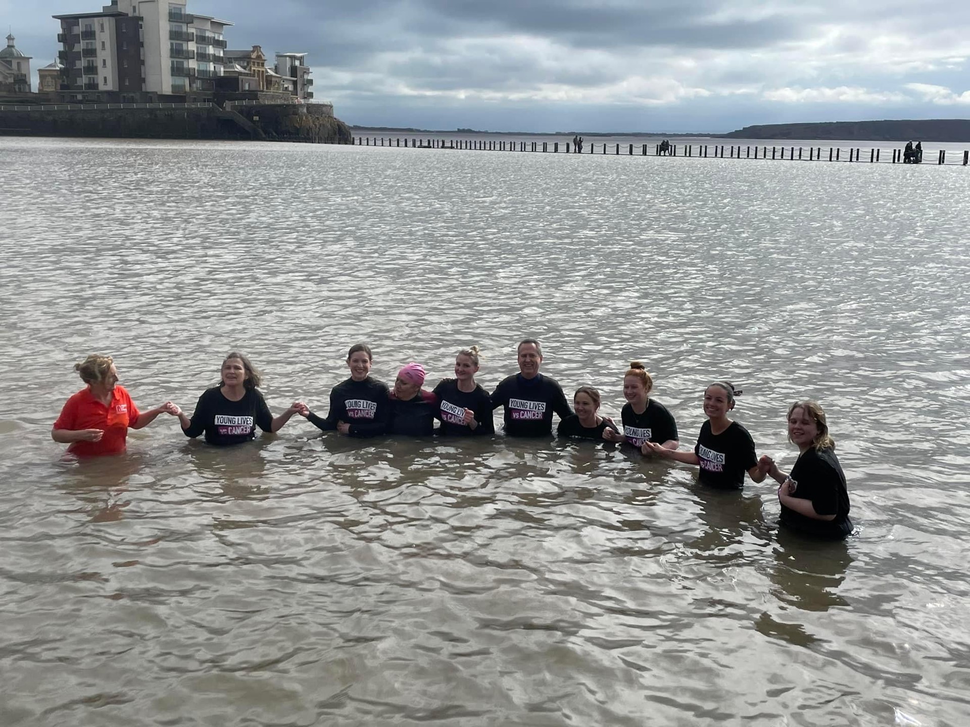 The Right at Home North Somerset team braving the chilly waters of Marine Lake, WsM
