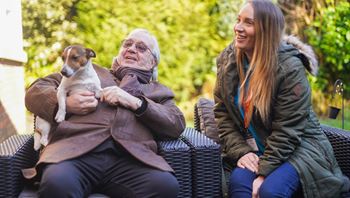 Carer spending time with client outside